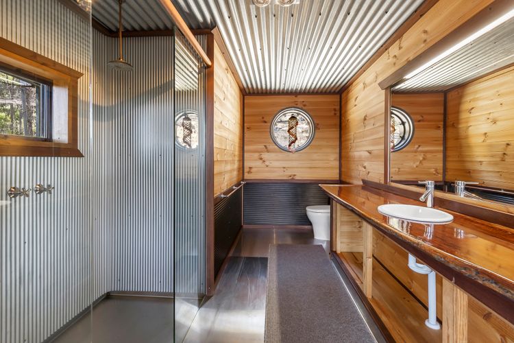Rustic master ensuite with double shower and toilet