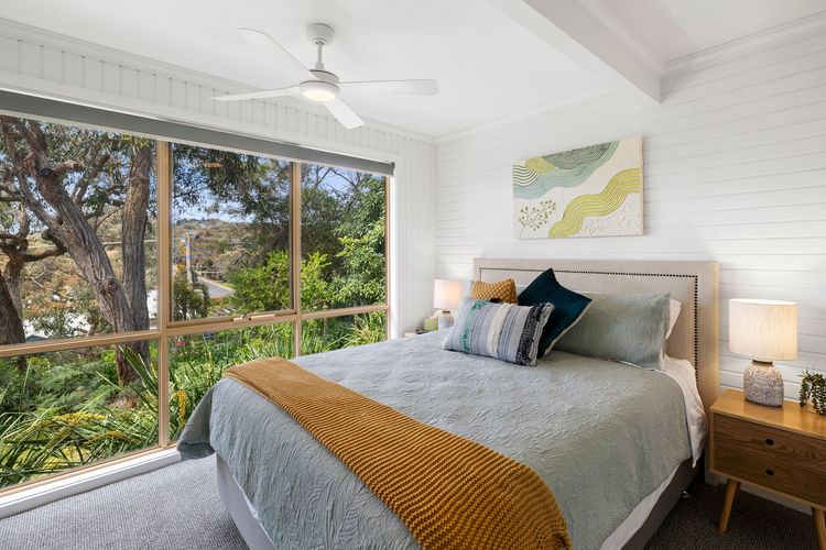 Bedroom 1: Queen bed with a study desk, and a built-in robe.