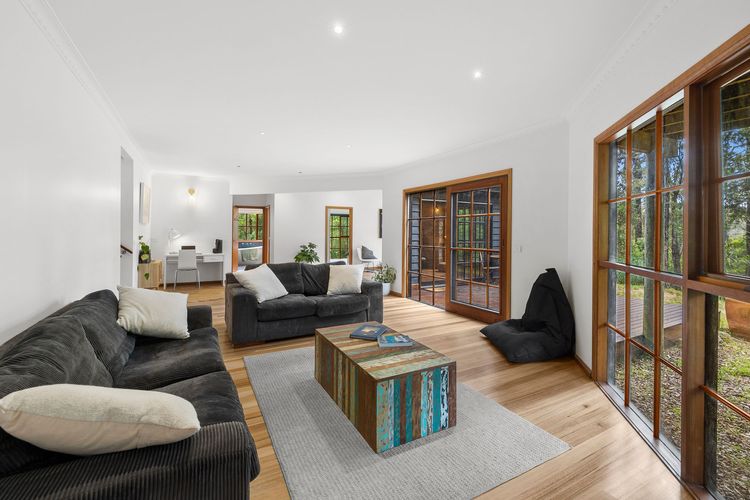 A cosy lounging area that faces the outdoors.