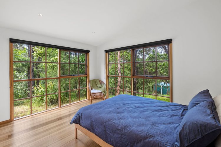 Bedroom 2: Queen bed with a built-in robe.