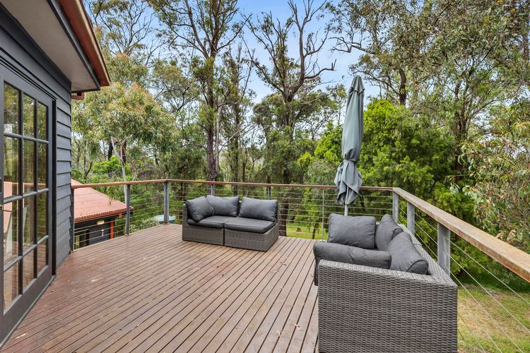 A balcony with cosy couches, inviting you to lounge.