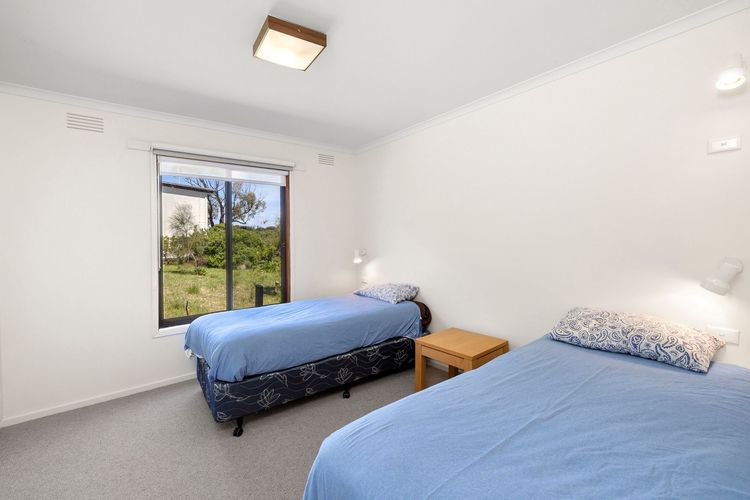 Bedroom Three has 2 Single beds also with a built-in robe.