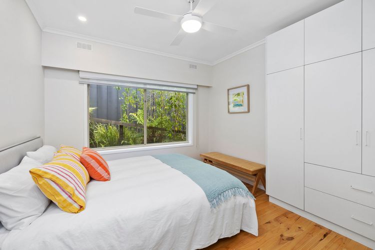 Bedroom 2: Queen bed and a built-in robe 