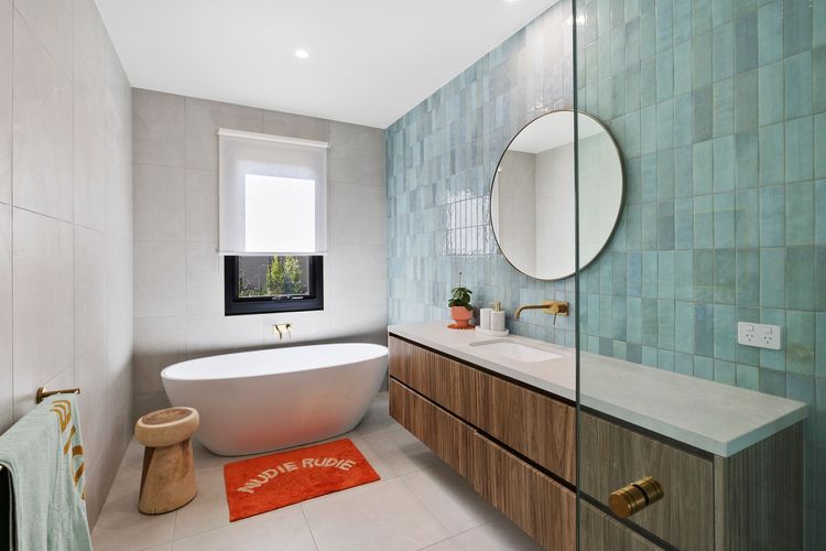 The main bathroom has a shower, toilet, and bathtub.