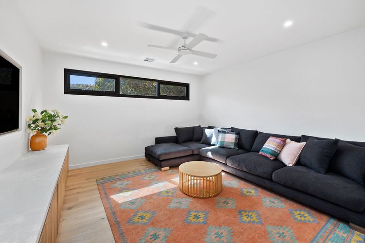 There’s also a second, more private living room with clerestory windows and comfy couches. 