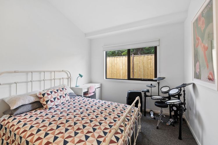 Bedroom 2: Queen bed and a built-in robe