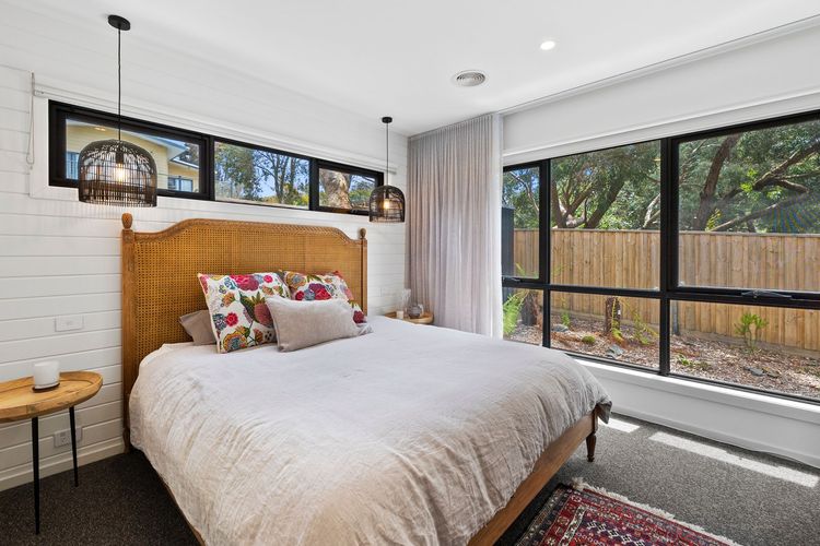 Bedroom 4: A king bed, a built-in robe, and an ensuite with a shower and toilet.