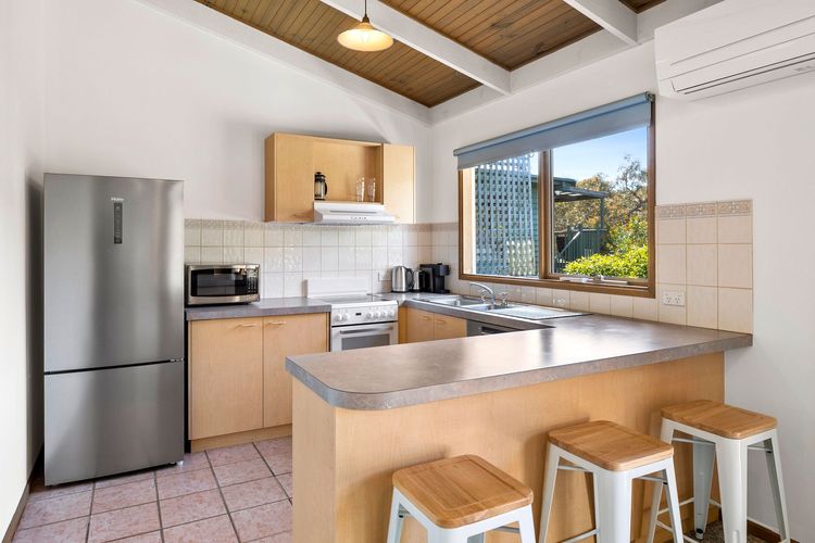 Cooking is made simple thanks to the kitchen's modern equipment and tools.