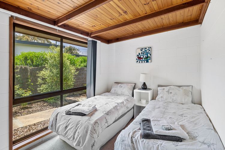 Bedroom 2: 2 Single beds and a free-standing robe