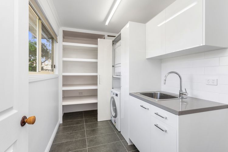 The kitchen's modern amenities and equipment, preparing a feast or casual meals for the family is a breeze