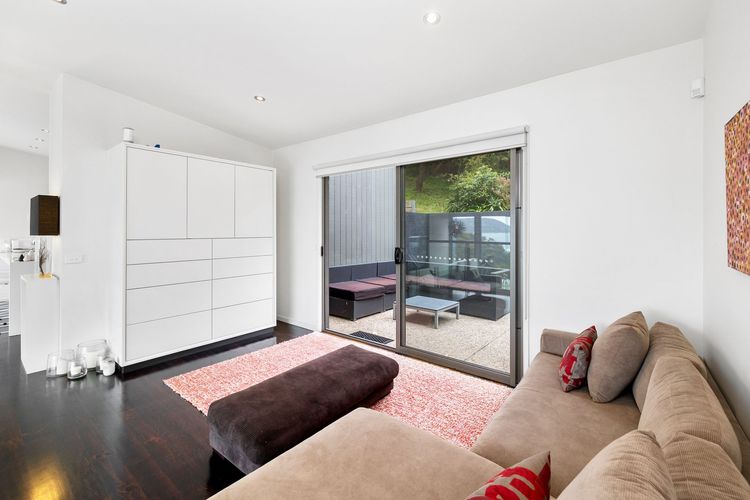 Downstairs living room and inviting couches, all set to give you a relaxing getaway.