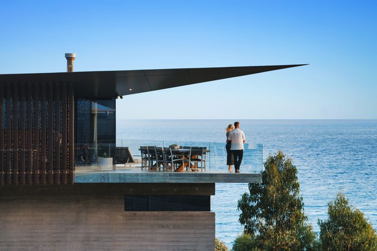 Expansive deck with seating and dining areas