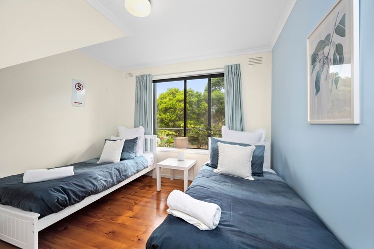 Bedroom1 with two single beds with lots of natural light