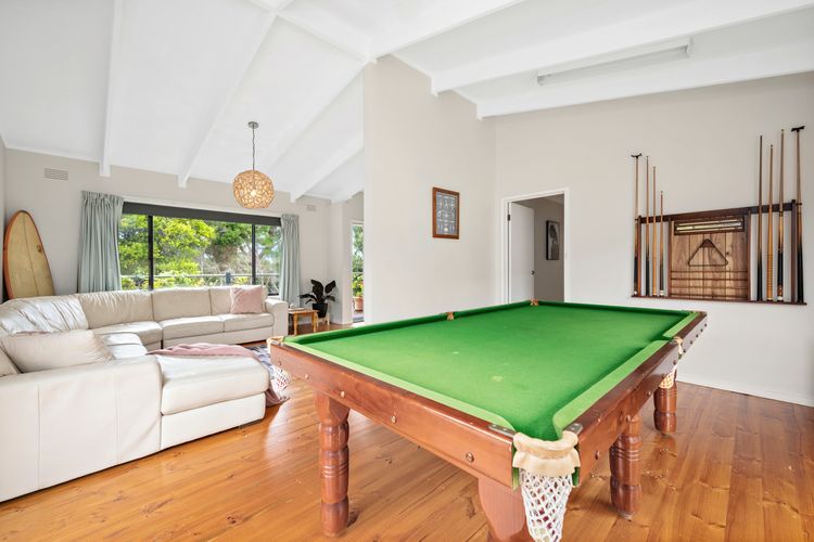 Lounge 1 with super sized sofa, TV and pool table