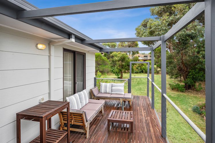 Wrap around balcony deck with seating
