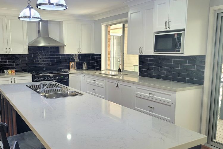 Seachange – Vincentia –  with water views and outdoor entertaining area – FREE WIFI, Pet Friendly