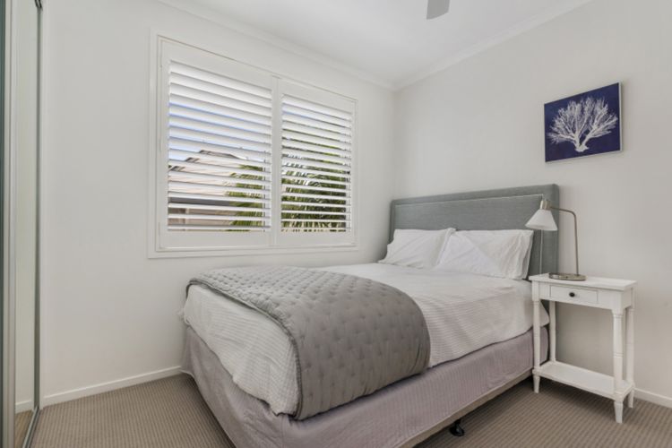 Bedroom 5: This bedroom also has a Sealy Ultra Plush Queen bed and a built-in robe.