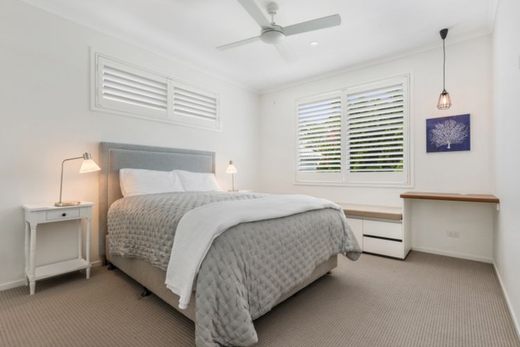 Bedroom 4: This bedroom has a Sealy Ultra Plush Queen bed and a built-in robe.