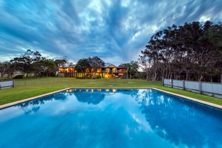 View from the large pool to the back of Tranquilo Beach House The pool at our holiday home in Woolgoolga is 10 metres x 10 metres, enough space for the whole family. 