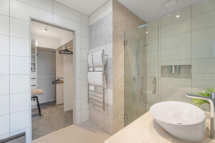 Ensuite bathroom with walk-in wardrobe.