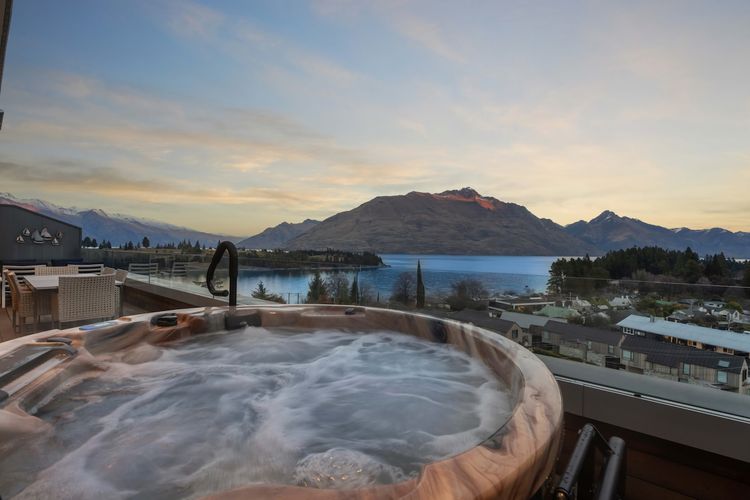 Recently installed outdoor hot tub overlooking Lake Wakatipu and Cecil Peak.