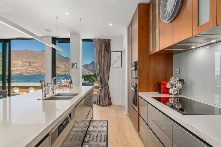 Full kitchen with modern appliances.