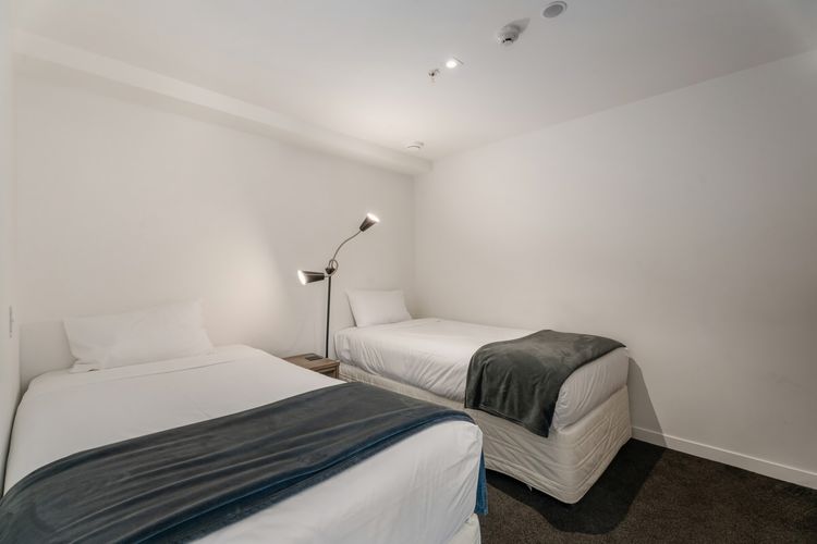 Bedroom 2 can be made up a king bed or two singles. Please let us know your preference.