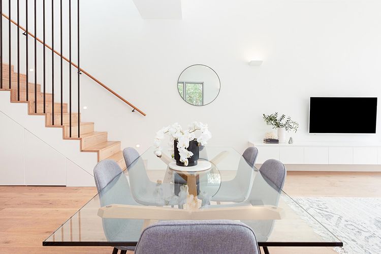 Gather for memorable meals in the elegant dining area, seating six in style