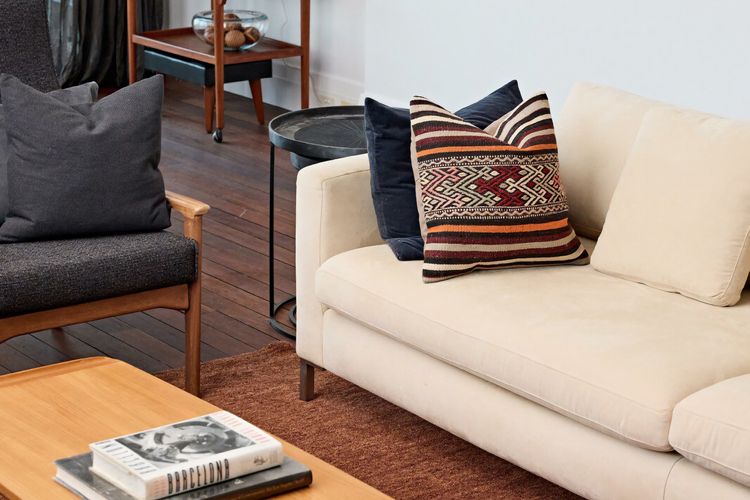 Sink into low cream sofa
