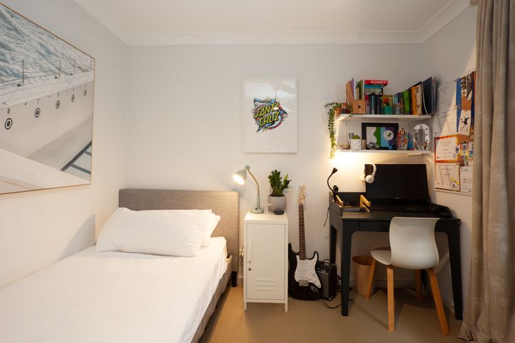 Bedroom with dedicated workplace