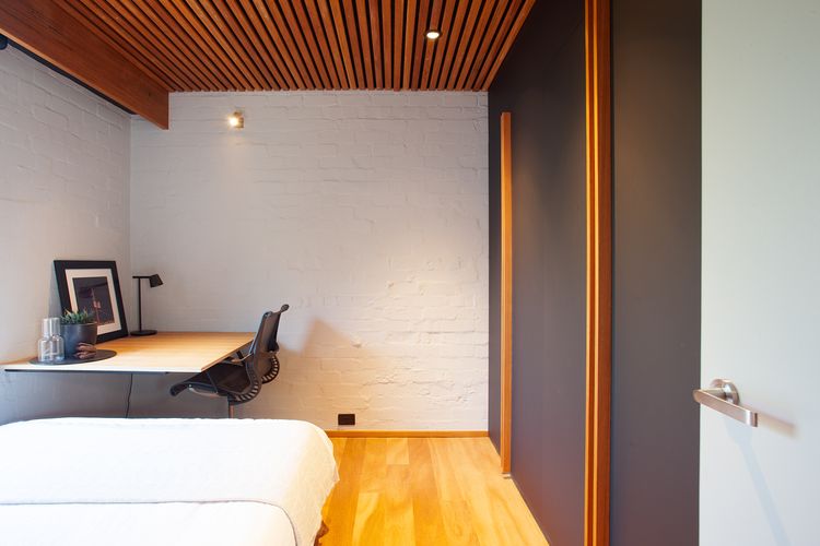 Bedroom with dedicated workplace