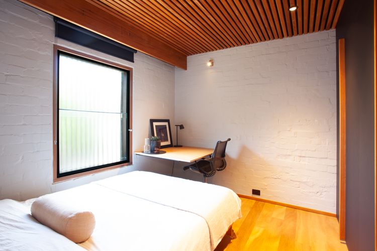 Bedroom with dedicated workplace
