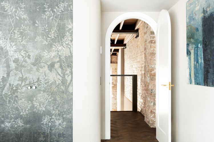 Captivated by exposed brick and lofty ceilings.