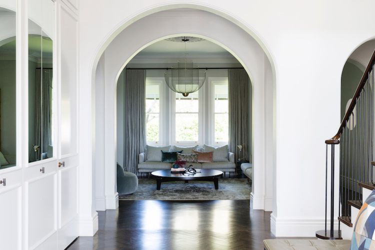 Opulent living spaces with dramatic chandeliers and stylish decor.