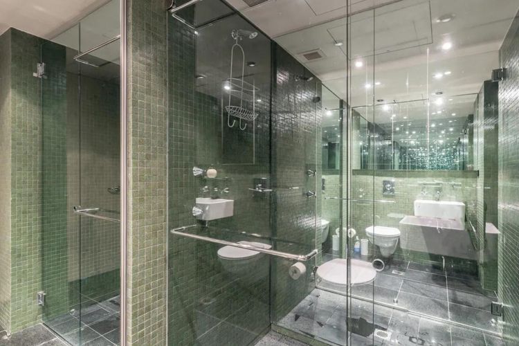 Luxuriate in our sleek and modern bathroom sanctuary.