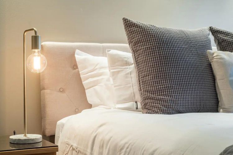 Rest and relaxation await in our elegantly appointed bedroom.