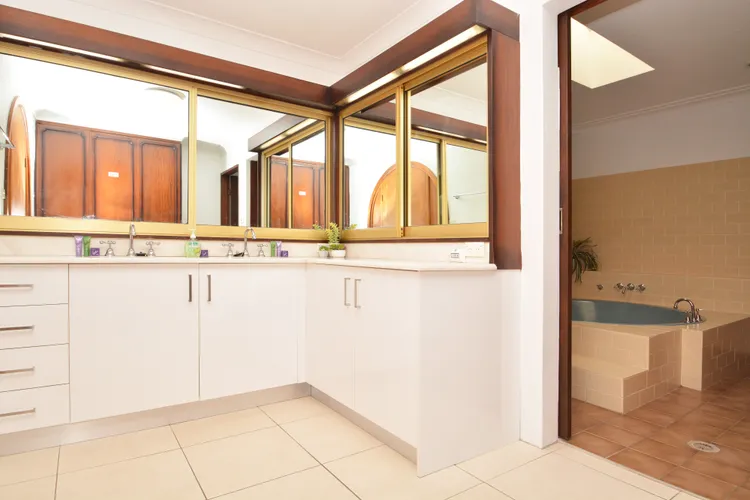 Bathroom with shower, toilet and large bathtub