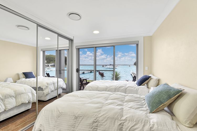 The Boat House – Absolute Waterfront 3br + Jetty