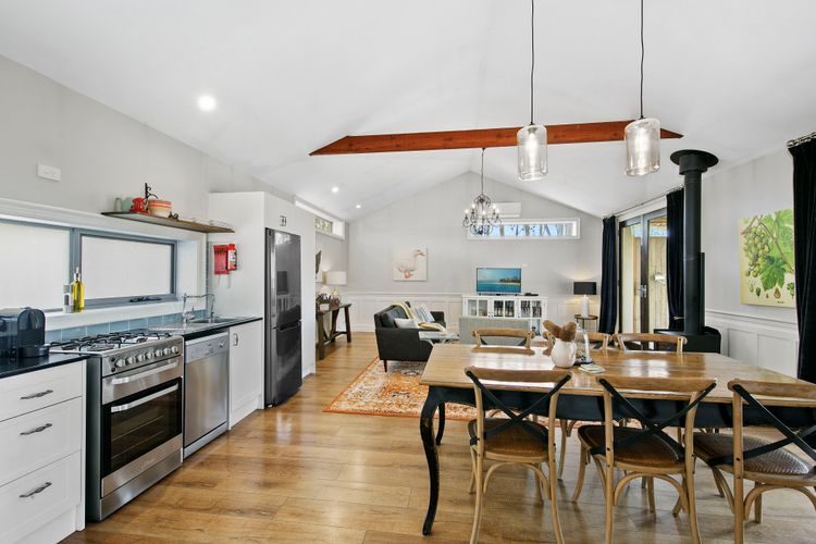 Kitchen, dining and lounge room in a countryside villa