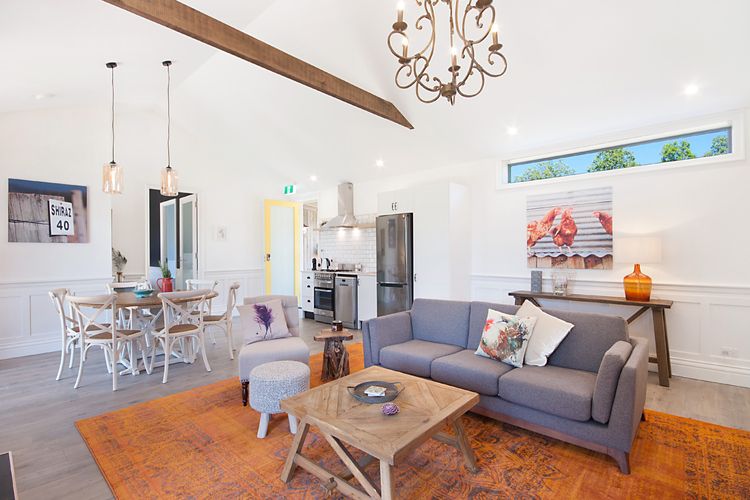 Countryside cabin lounge room, dining and kitchen