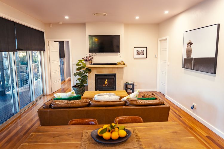 Lounge room with fireplace and flatscreen TV