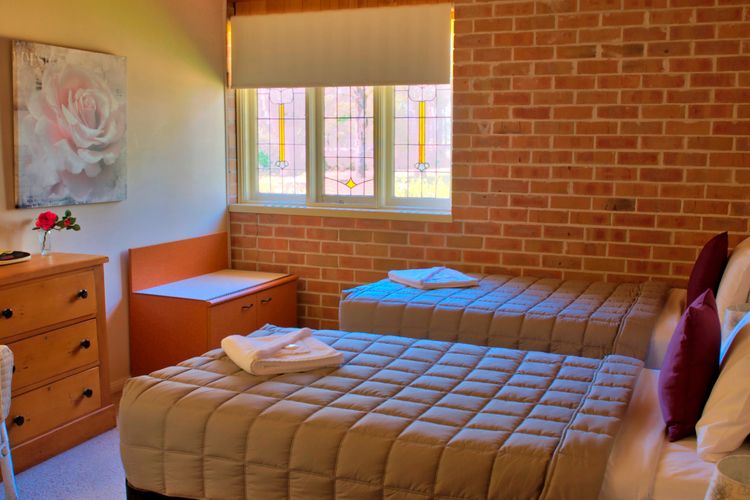 Twin Comfort: Cozy Retreat with Two Inviting Single Beds