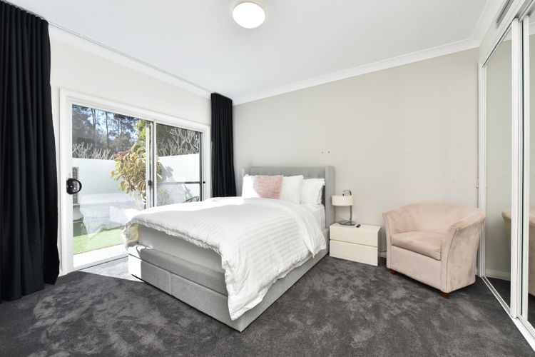 Lake Palm Resort Luxury Retreat absolute Waterfront on 3 acres at Lake Macquarie.