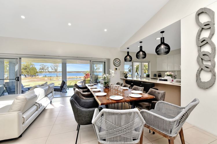 Lake Palm Resort Luxury Retreat absolute Waterfront on 3 acres at Lake Macquarie.