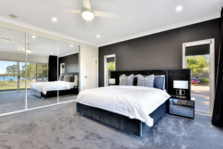 Lake Palm Resort Luxury Retreat absolute Waterfront on 3 acres at Lake Macquarie.