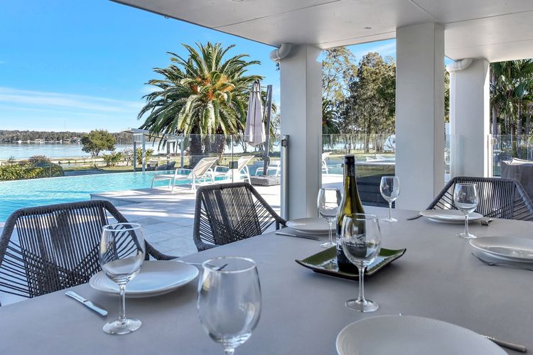 Lake Palm Resort Luxury Retreat absolute Waterfront on 3 acres at Lake Macquarie.