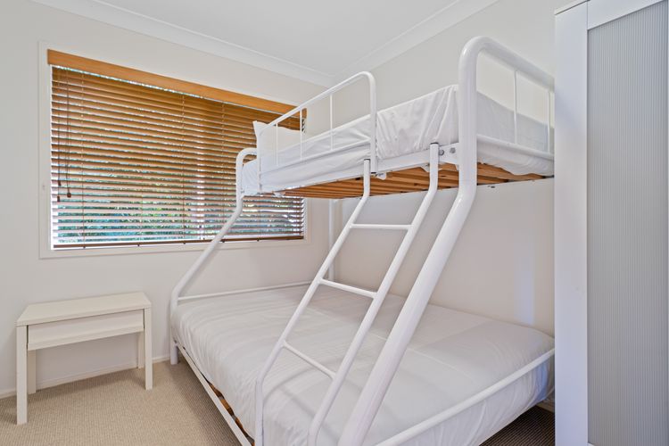 Bedroom with Double bed at the bottom and a single bed on top