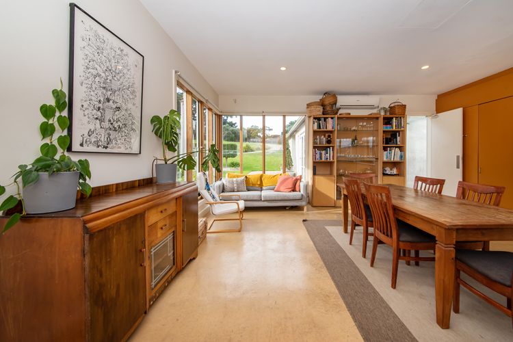 Kitchen, informal dining and seating area 