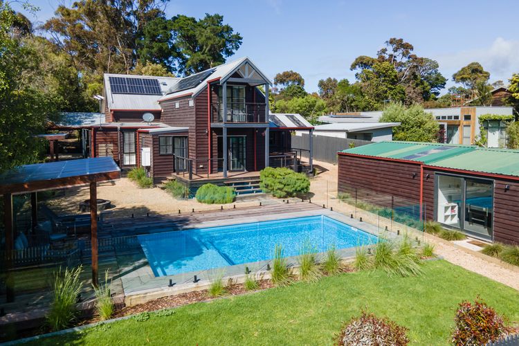 Back Garden with view of Pool and Games Room