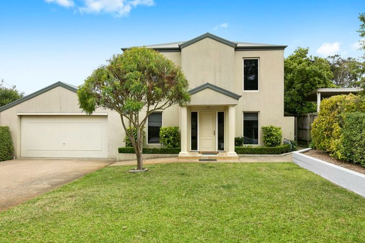 Spacious front yard with garage